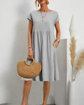 Women's Midi Dress - Loose Fit - Short Sleeves - Round Neck - With Practical Pockets