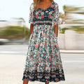 Women's Maxi Dress - Bohemian Style - Floral Print - Loose Fit - Short Sleeve - With Pockets