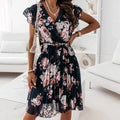 Women's Wrap Dress - Floral Print - V-Neck - Tied Waist - Knee-Length with Pleated Skirt