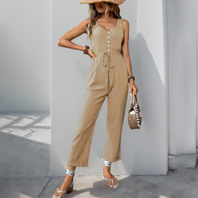 Women's jumpsuit – Sleeveless V-neck – Textured fabric – Relaxed fit – Belt at waist
