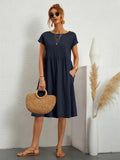 Women's Midi Dress - Loose Fit - Short Sleeves - Round Neck - With Side Pockets