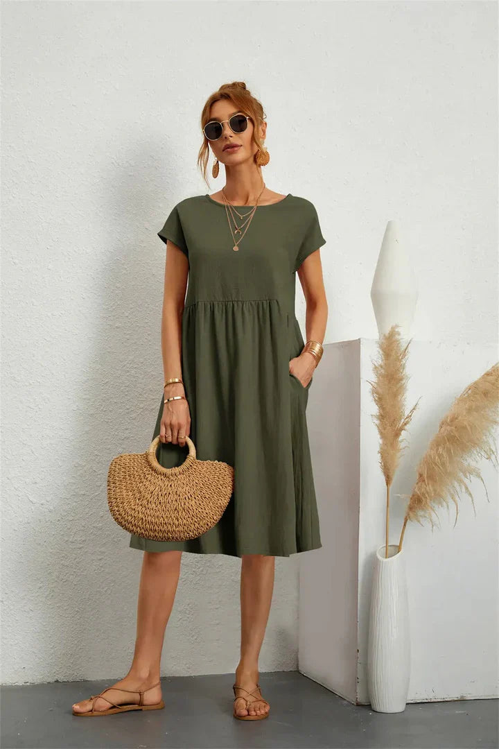 Women's Midi Dress - Loose Fit - Short Sleeves - Round Neck - With Side Pockets