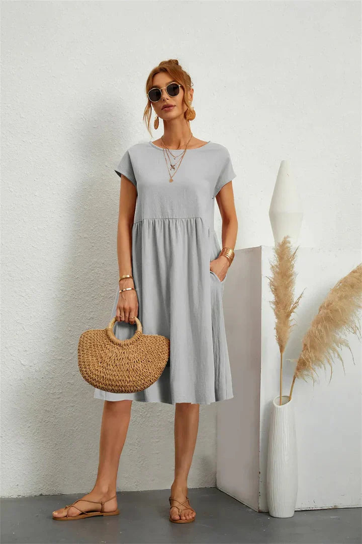 Women's Midi Dress - Loose Fit - Short Sleeves - Round Neck - With Side Pockets